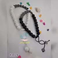 ست دستبند گره کشویی با مهره اونیکس سفید و مشکی و مهره حدید قلبی مشکی 