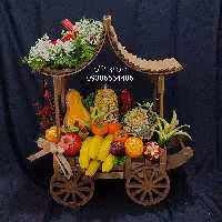 کالاسکه میوه آرایی شده همراه هندوانه و کدو و ظرف شیشه ای برای آجیل،میوه آرایی ،سبد میوه،میوه یلدا،کالاسکه میوه