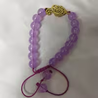 دستبند رنگ بنفش  پلاک استیل و رنگ ثابت نخ رنگ بنفش 