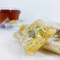 کنجد عسلی مغزدار سفید (1 عدد) شیرینی کنجدی کنجد بار سوغات دزفول 