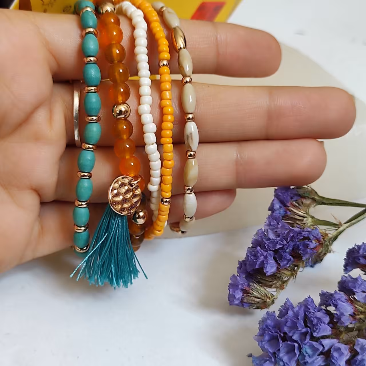 دستبند چهار لاین رنگی پنگی بسیار خاص و زیبا دستبند مهره ای رنگی آویز دار 