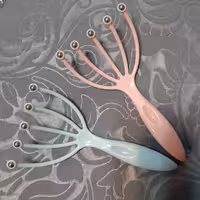 ماساژور سر و  بدن ضد استرس  و مناسب خون رسانی به پوست سر 5 غلتکی دسته بدون ساچمه