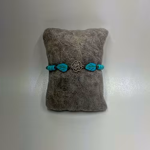 دستبند رنگ آبی فیروزه ایی وزن 6 گرم و اندازه 26/5سانتیمتر 