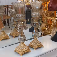 شمعدان کریستالی پایه فلزی آبکاری  رنگبندی پایه طلایی سیلور  و آنتیک 