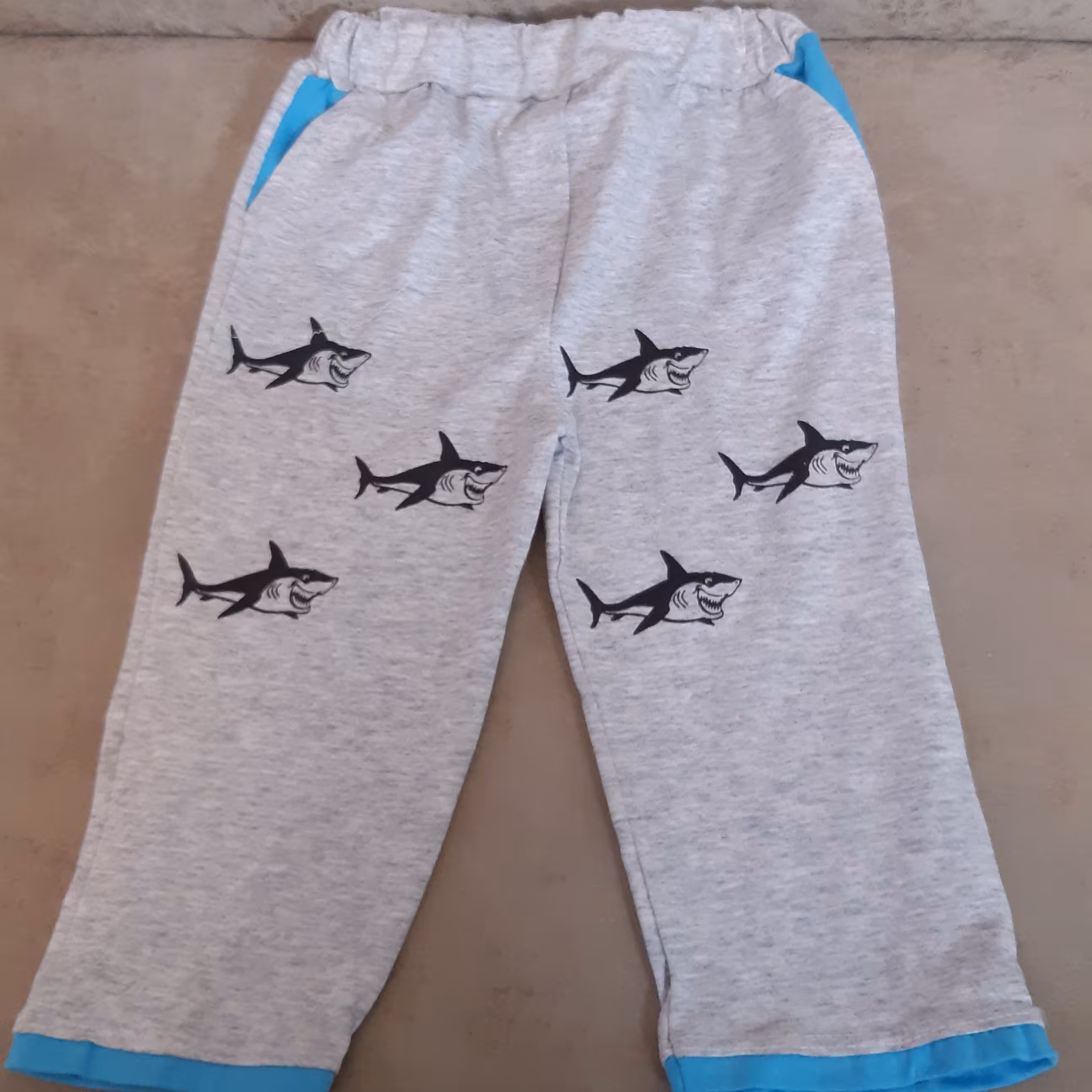 شلوار و شلوارک  بچگانه پسرانه و دخترانه اسپرت کمر کش و جیب دار 