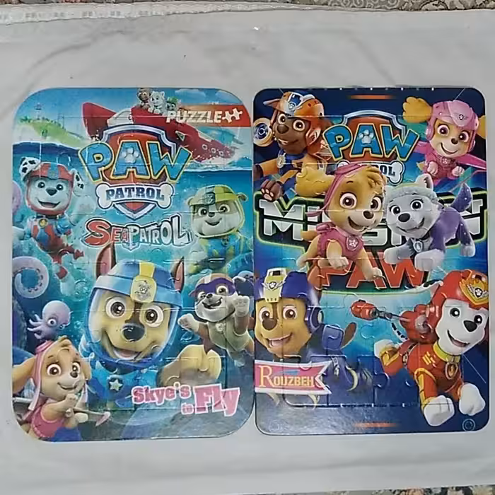 پازل سگهای نگهبان پشت منچ و مارپله بهمراه منچ و تاس