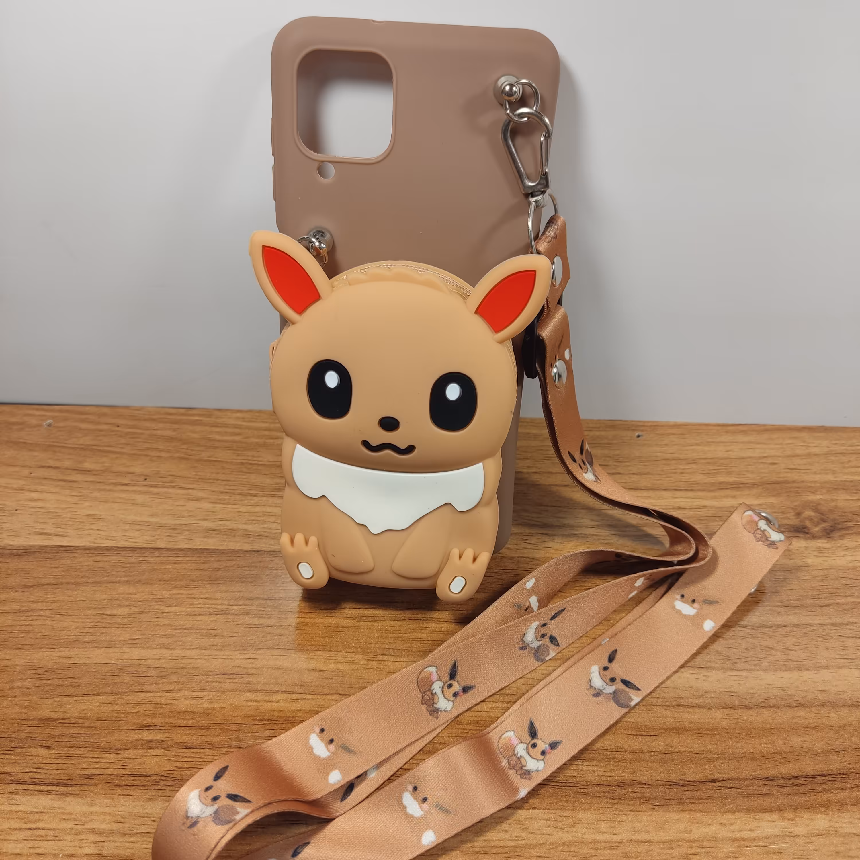 گارد عروسکی سیلیکونی بگ دار  پوکمون قهوه ای  A12 4g 5g