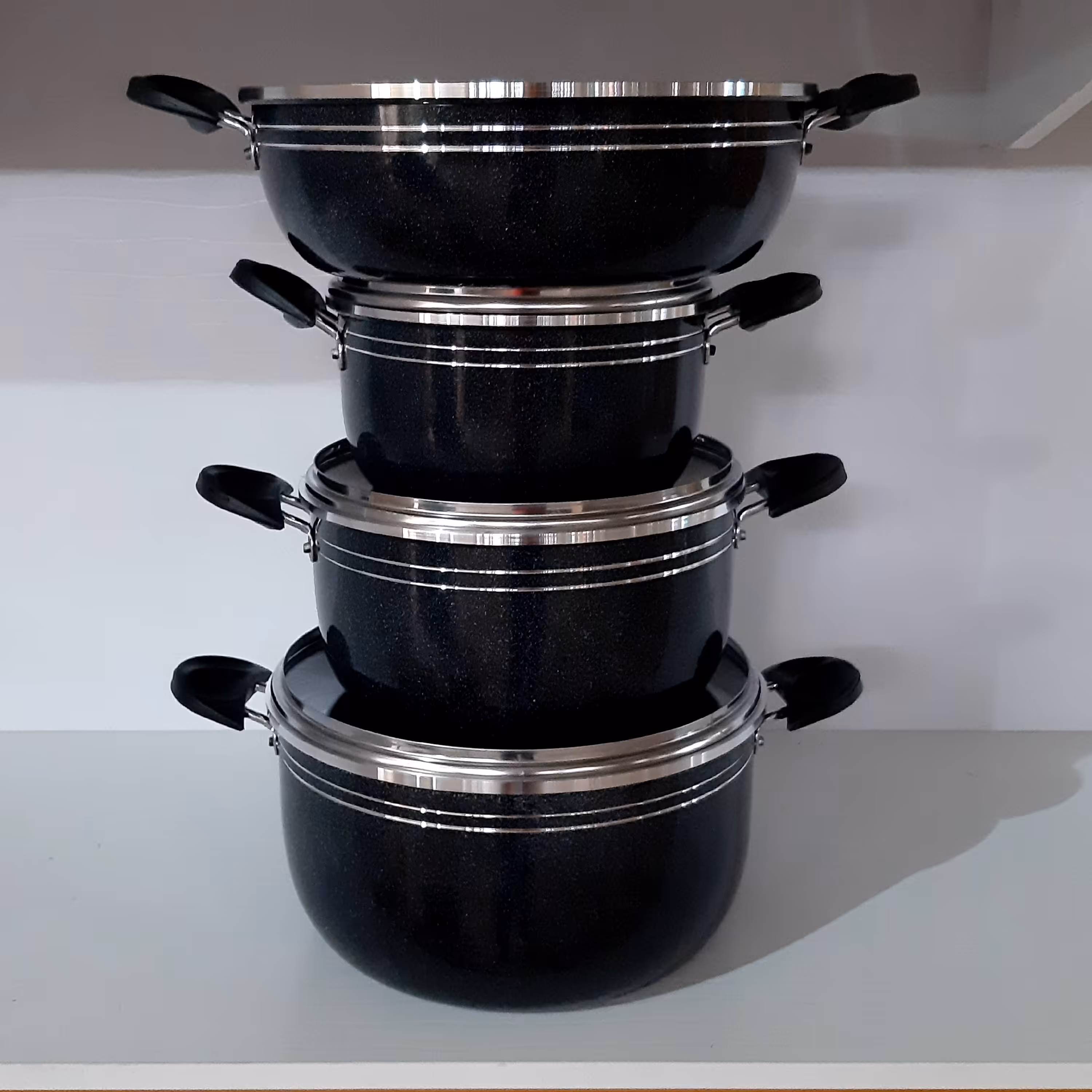 سرویس قابلمه 7 پارچه گرانیت ساده مشکی طرح چدن برند اوج  جنس ضخیم و محکم و گرانیت عالی 