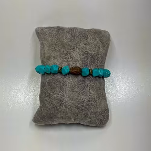 دستبند رنگ آبی فیروزه ایی وزن 9 گرم اندازه 31 سانتیمتر 