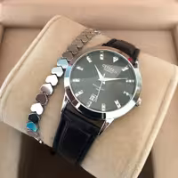 ساعت زنانه بندچرمی بهمراه دیتبند حدید