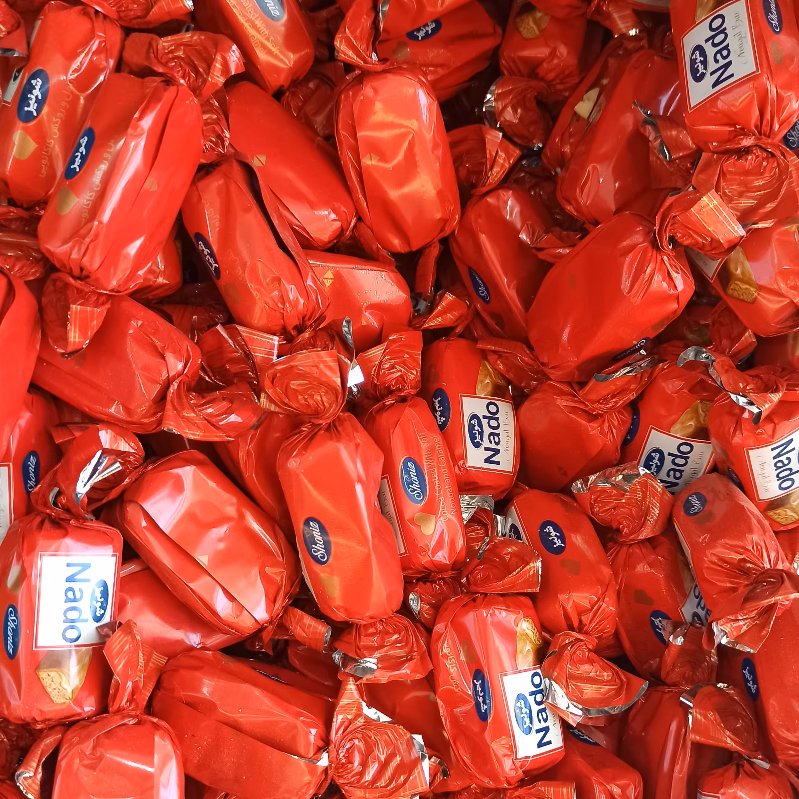 شکلات نوقا با روکش کاکائویی نادو دوسر پیچ شونیز (500 گرم)