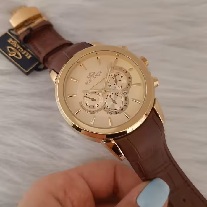 ساعت مچی مردانه ساعت مچی زنانه الگانس  اصل موتور ژاپن رنگ ثابت قفل پروانه ای تک موتوره طرح سه موتوره دارای تقویم