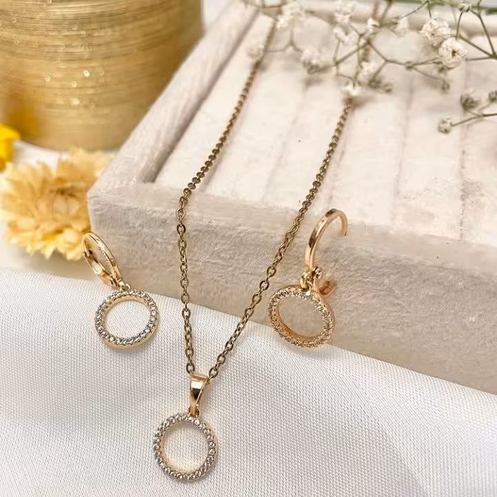 نیم ست نگین دار دایره مارک ژوپینگ استیل زنانه دخترانه طرح طلا تمام مخراجکاری شده