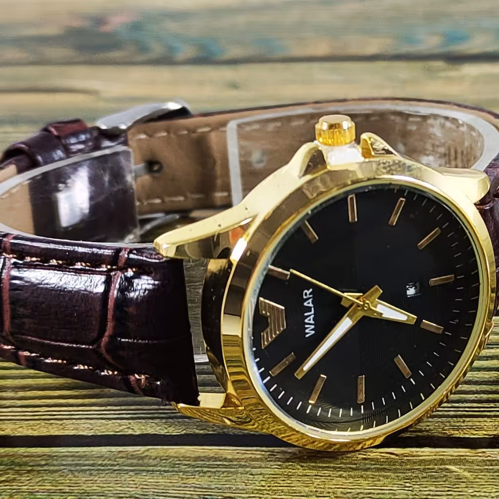ساعت زنانه والار بند چرم قهوه ای بدنه طلایی
