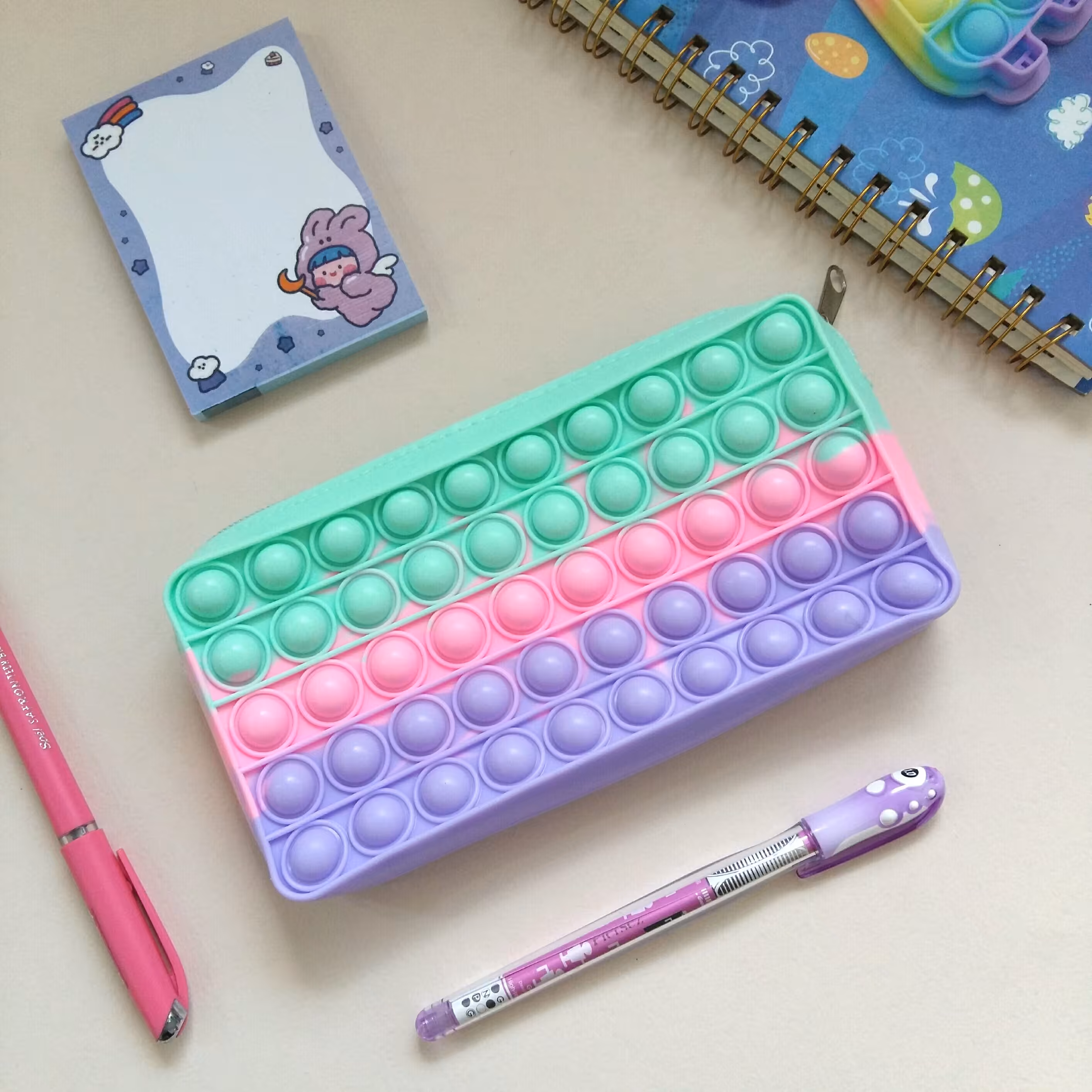جامدادی پاپیت سیلیکونی فانتزی رنگین کمانی جا مدادی پاپیتی پاپتی کیف جاقلمی پاستلی سلیکونی پاپ ایت کتابی دو رو چند رنگ