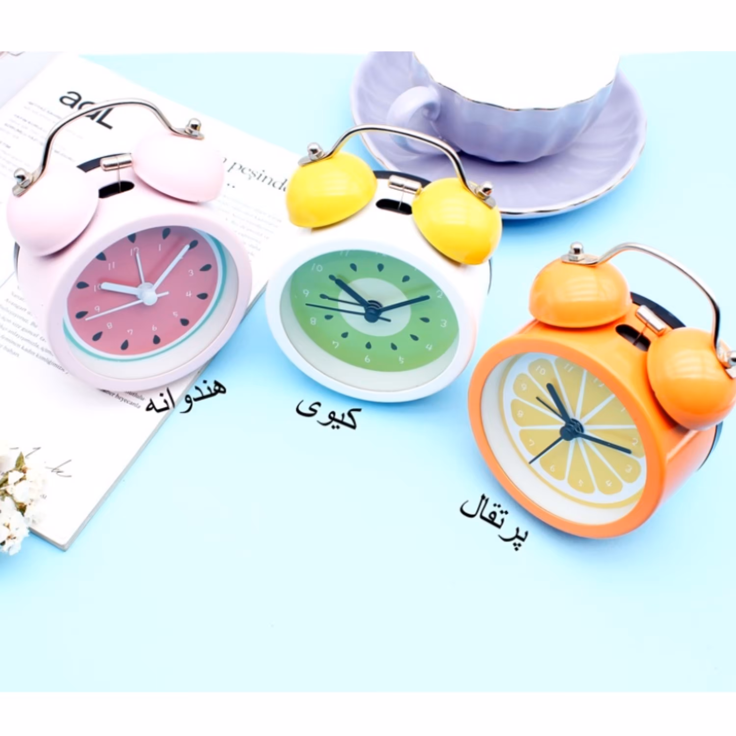 ساعت رومیزی زنگ دار طرح میوه جنس بدنه فلزی