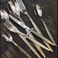 سرویس قاشق و چنگال یونیک24نفره 120 پارچه یونیک دهانه اروپایی نیمه طلای