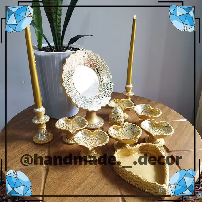 هفت سین یازده تکه آینه کاری سفالی در دو رنگ سفیدطلایی و طلایی 