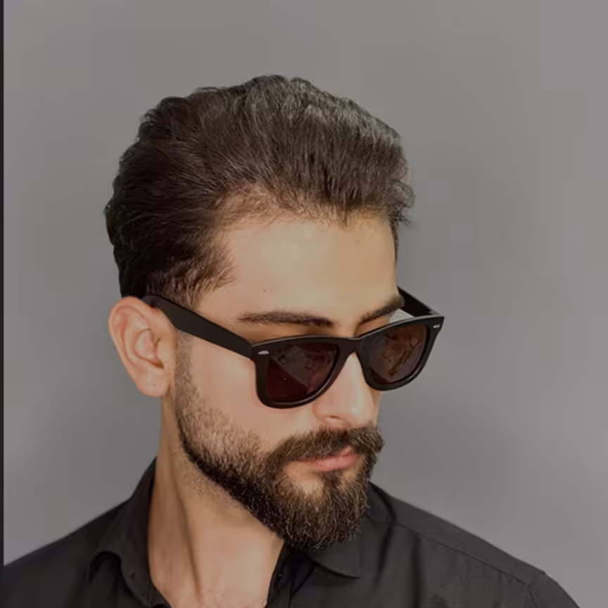 عینک آفتابی مردانه اورجینال قهوه ای ری بن یووی400.
