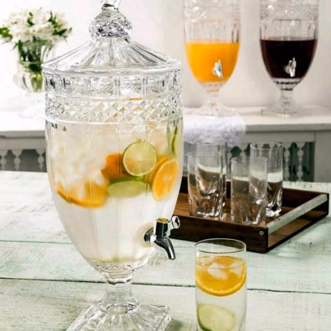 کلمن شیشه ایی 5 لیتری درطرح مختلف یک عدد