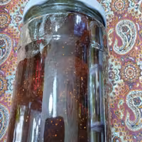 مربا توت فرنگی خانگی خوش طعم و عالی با تکه های درسته وزن با شیشه 1250 گرم 