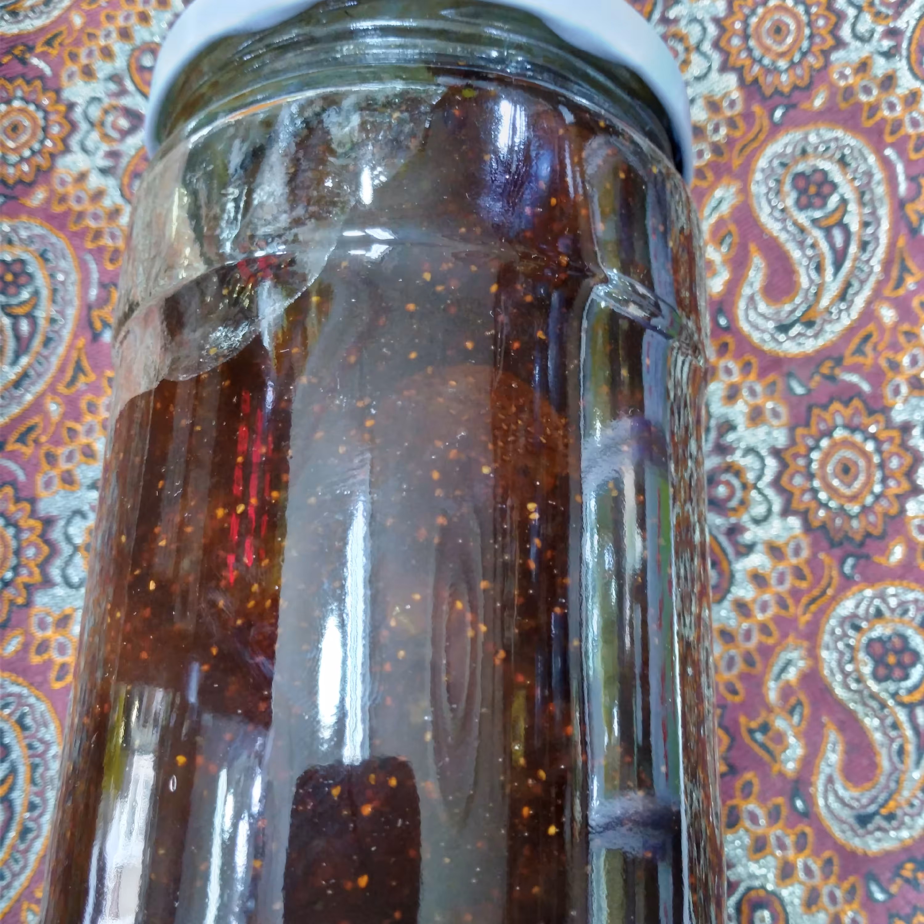 مربا توت فرنگی خانگی خوش طعم و عالی با تکه های درسته وزن با شیشه 1250 گرم 