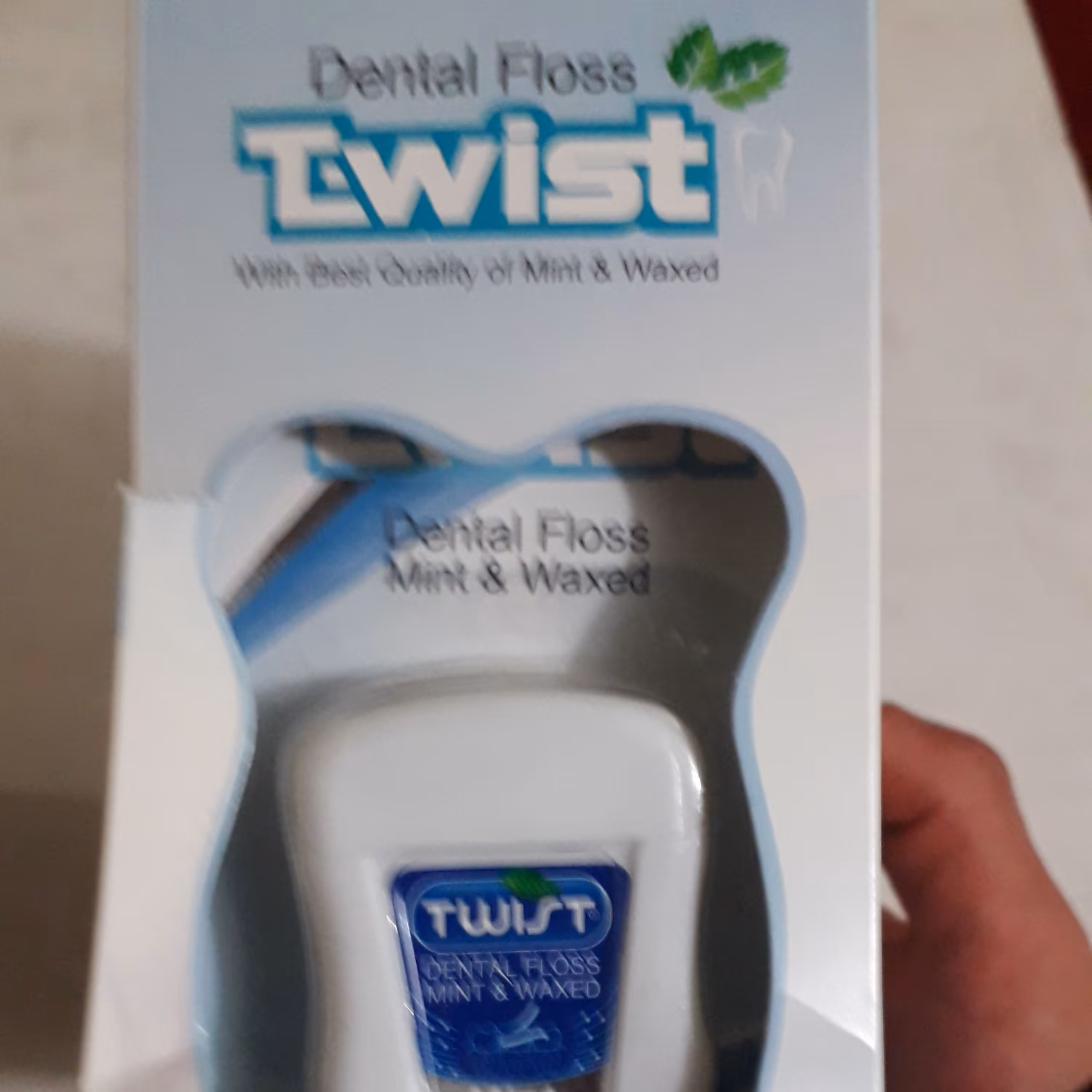 نخ دندان تویست