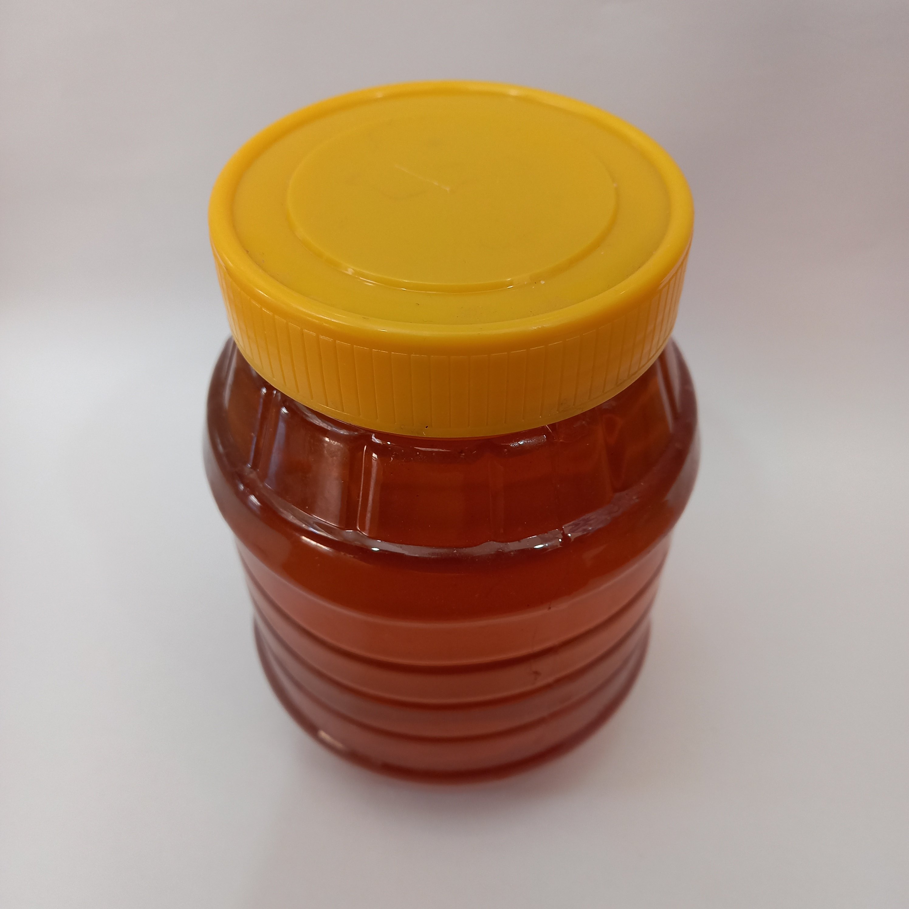 عسل چندگیاه محصول دشت های شیراز طبیعی بهاره(مستقیم از زنبوردار)