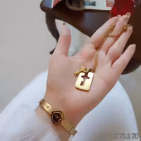 ست دستبند و گردنبند اسپورتی. جنس استیل. رنگ ثابت.مدل قفل و کلید 2