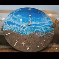 ساعت رزینی  طرح دریا با شن و صدف طبیعی