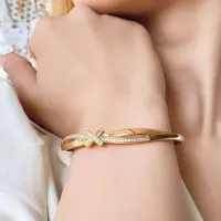 دستبند ژوپینگ النگویی طرح اینفینیتی نگین دار