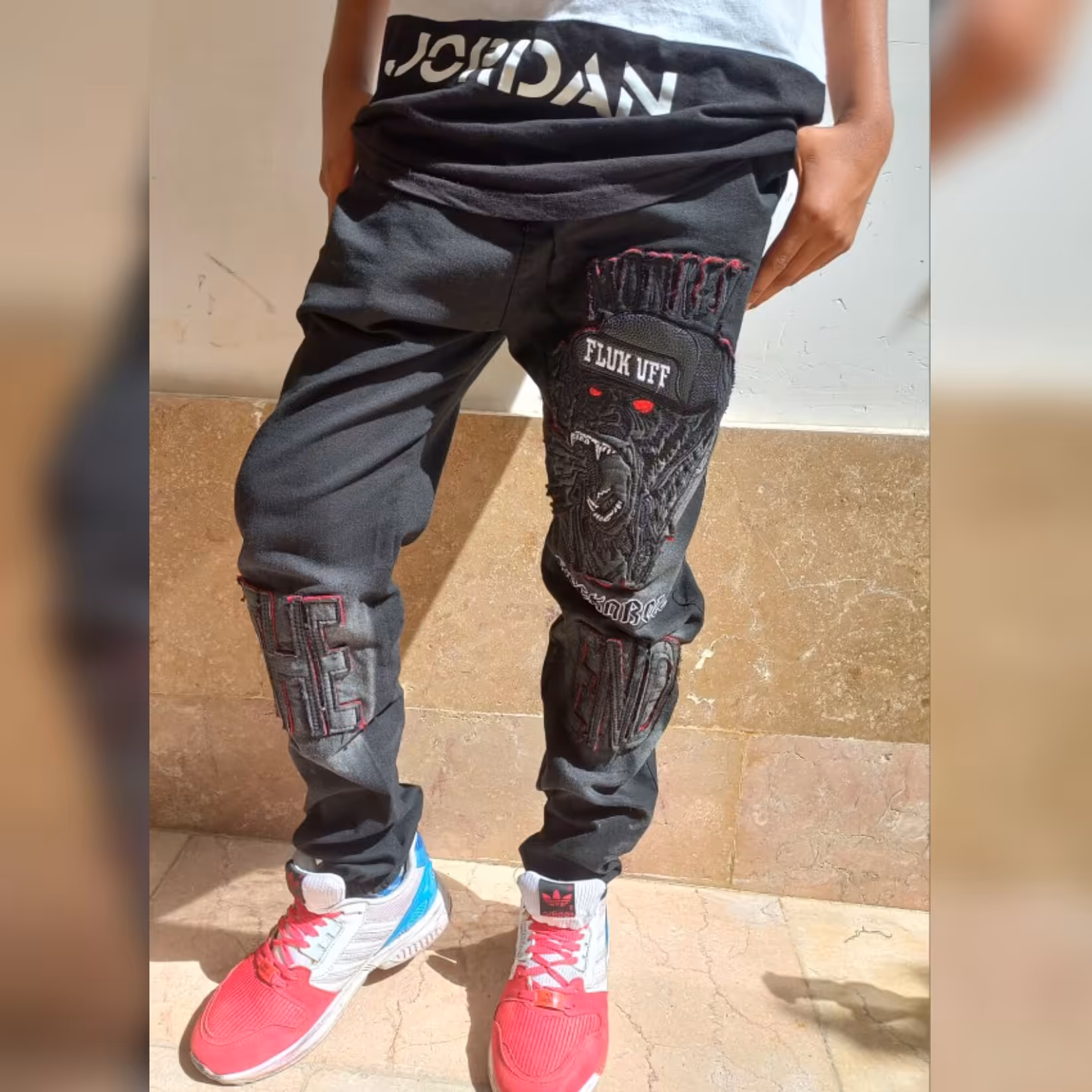 شلوار اسلش نیل اعلاءگلدوزی اسکلت مشکی سایز 80 پسرانه