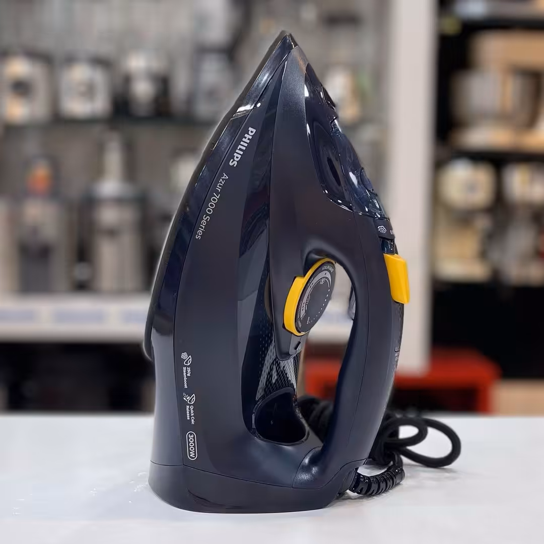 اتو 7060 فیلیپس توان مصرفی 3000 وات جنس کف اسلیم گلایدالیت بخاردهی عمودی 250 گرم بخاردهی لحظه ای دارای مخزن رسوب 