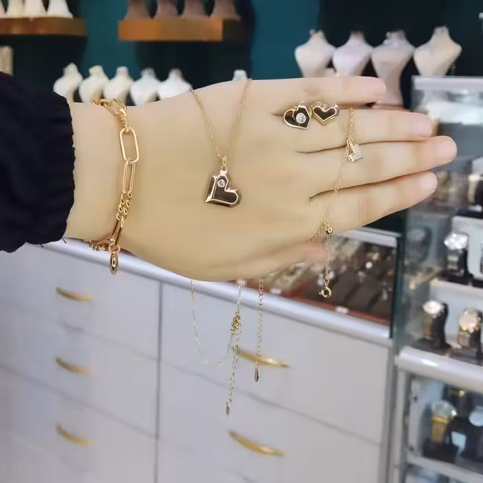 سرویس ژوپینگ شامل نیم ست و دستبند و پابند طرح جذاب قلب 