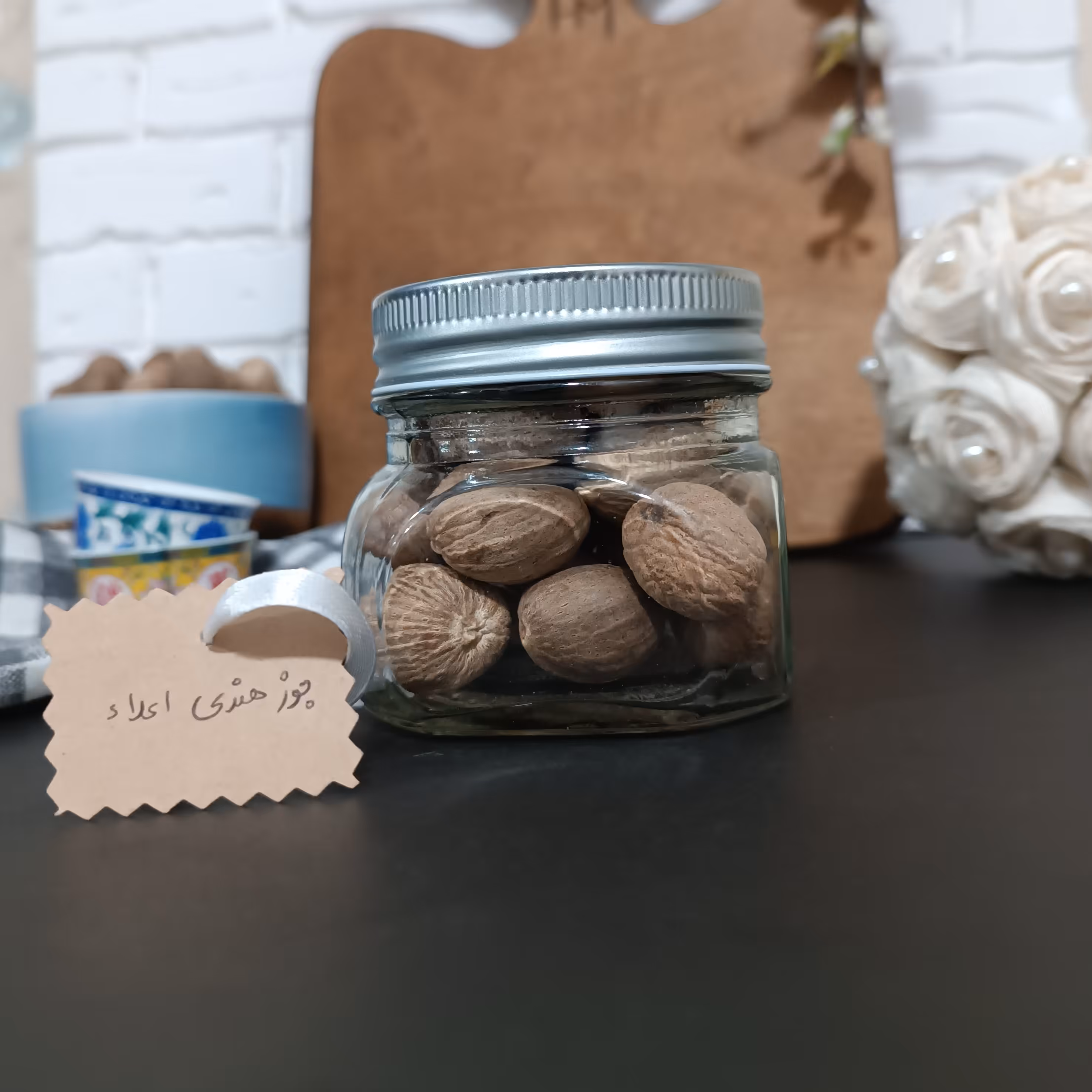 جوز هندی درجه یک 100 گرمی ظرف شیشه ای 