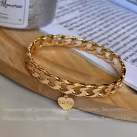 دستبند  بنگل کارتیر و آویز قلب ژوپینگ