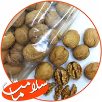 گردو وارداتی سفیدو خوشمزه 1800گرمی تضمین کیفیت