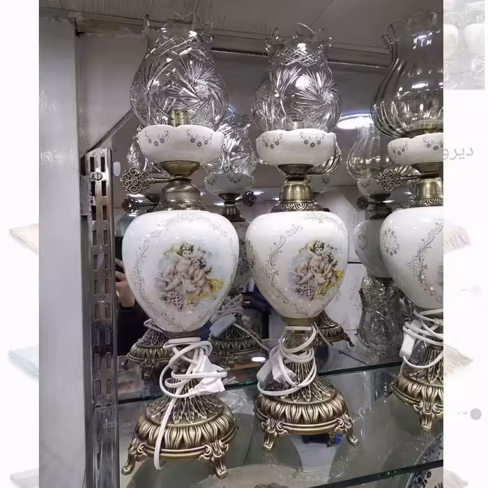 شمعدان لاله 60 سانتی طرح فرشته  برنزی جنس آلومینیومی ابکاری شده اعلا  در چند رنگ( لاله کریستالی)