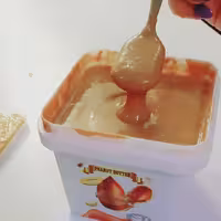 کره بادام زمینی نیم کیلویی اعلا آستانه اشرفیه