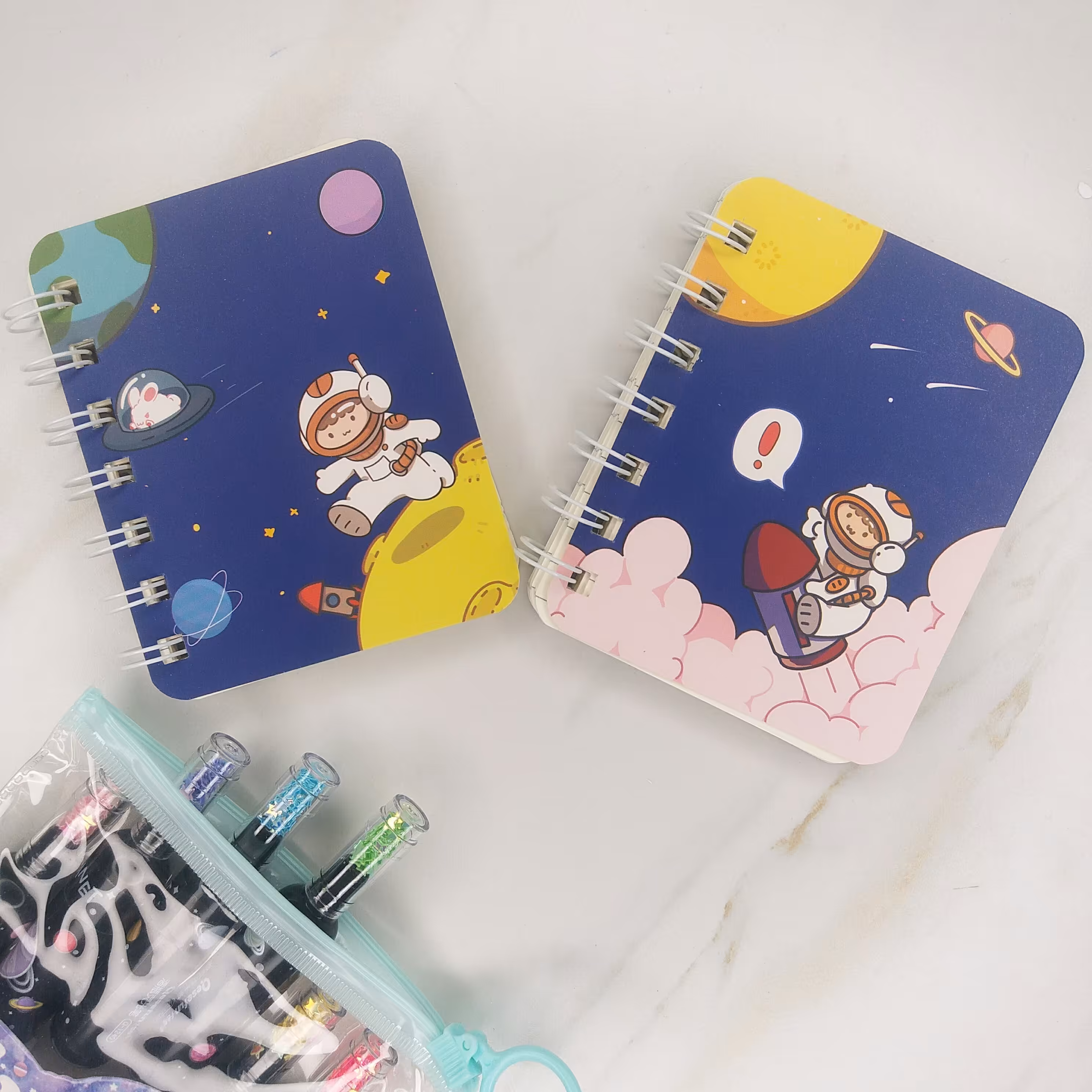 دفترچه سیمی فضانورد