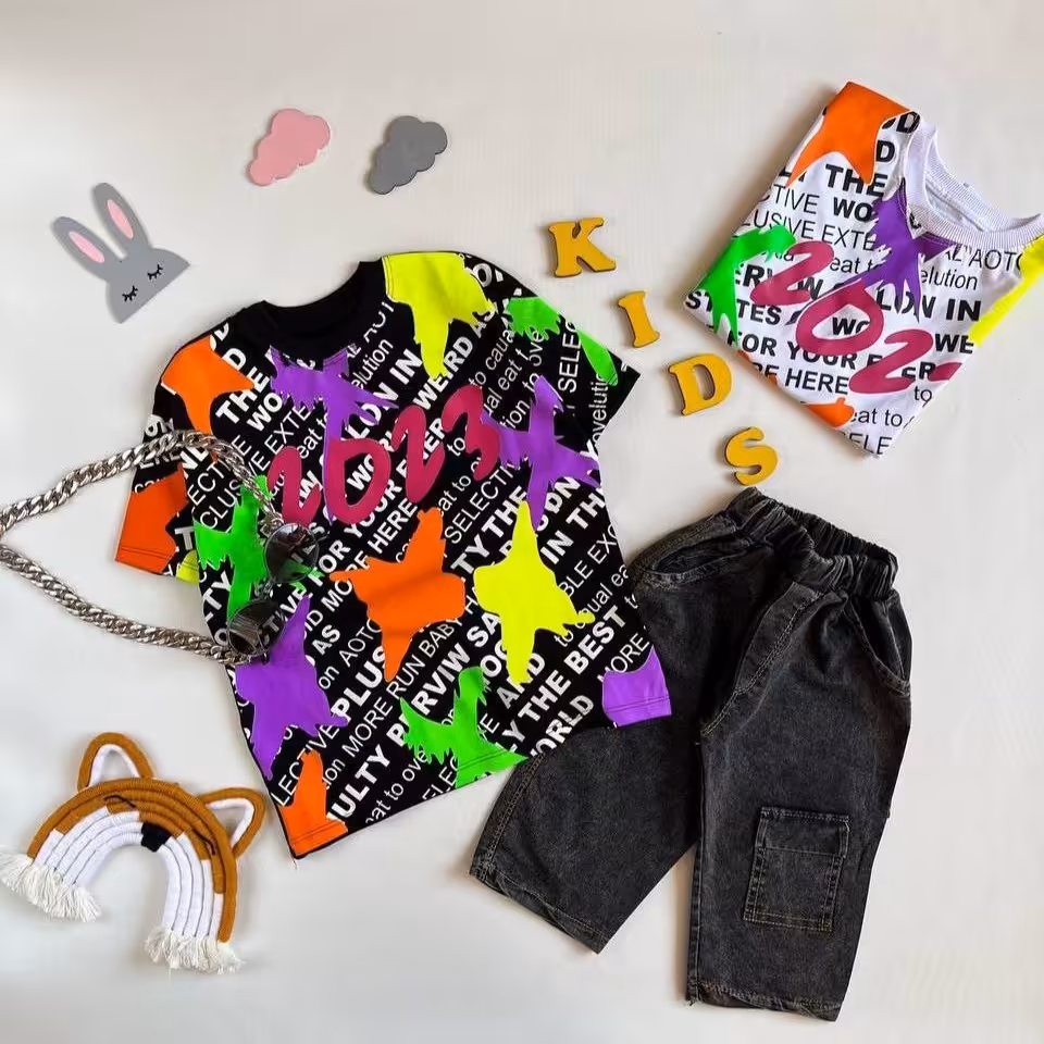 ست اسپورت بچگانه تیشرت و شلوارک جین کشی مناسب حدود سنی 3 تا 10 سال جنس تیشرت نخ پنبه لاکرا شیک و خوشگل 