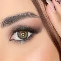 لنز چشم بیوتی سالیانه عسلی سبز هاله دار و رگه دار