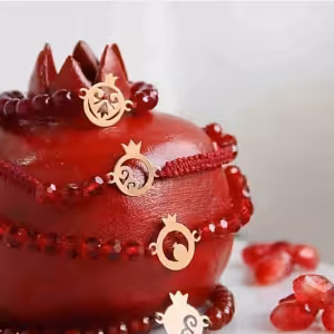 دستبند مهره ای با پلاک انار