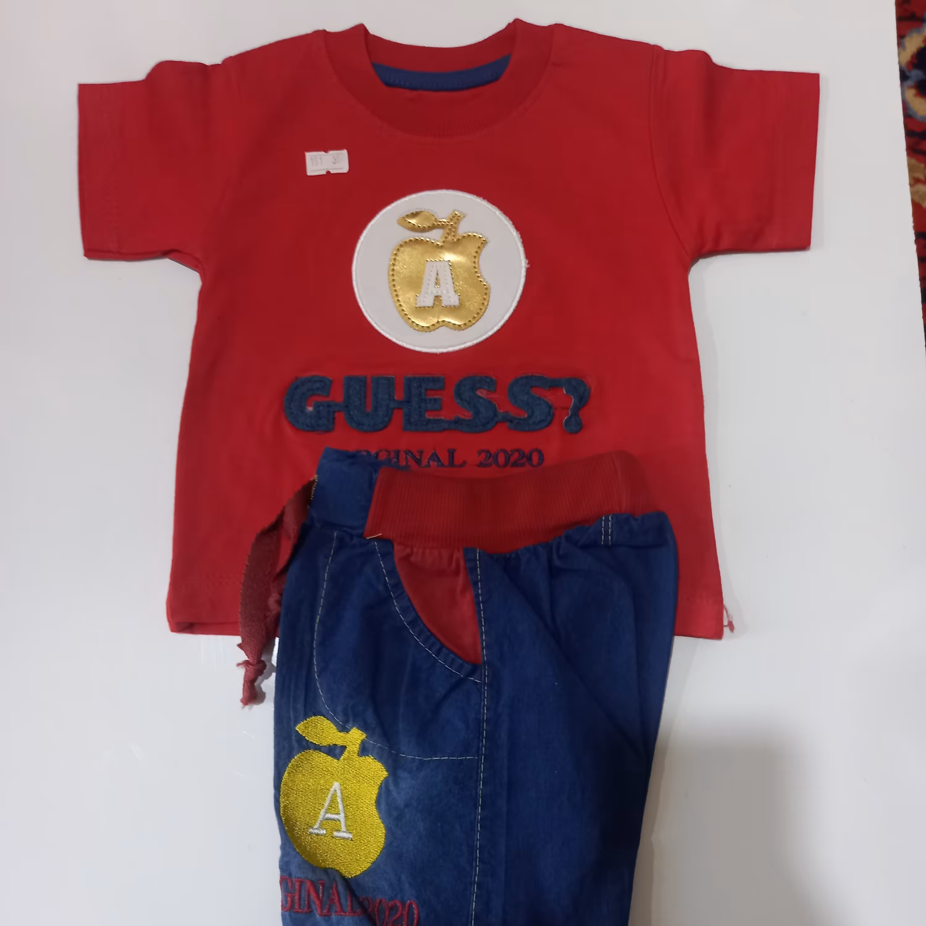 تیشرت شلوارک پسرانه طرح اپل،سایز 30