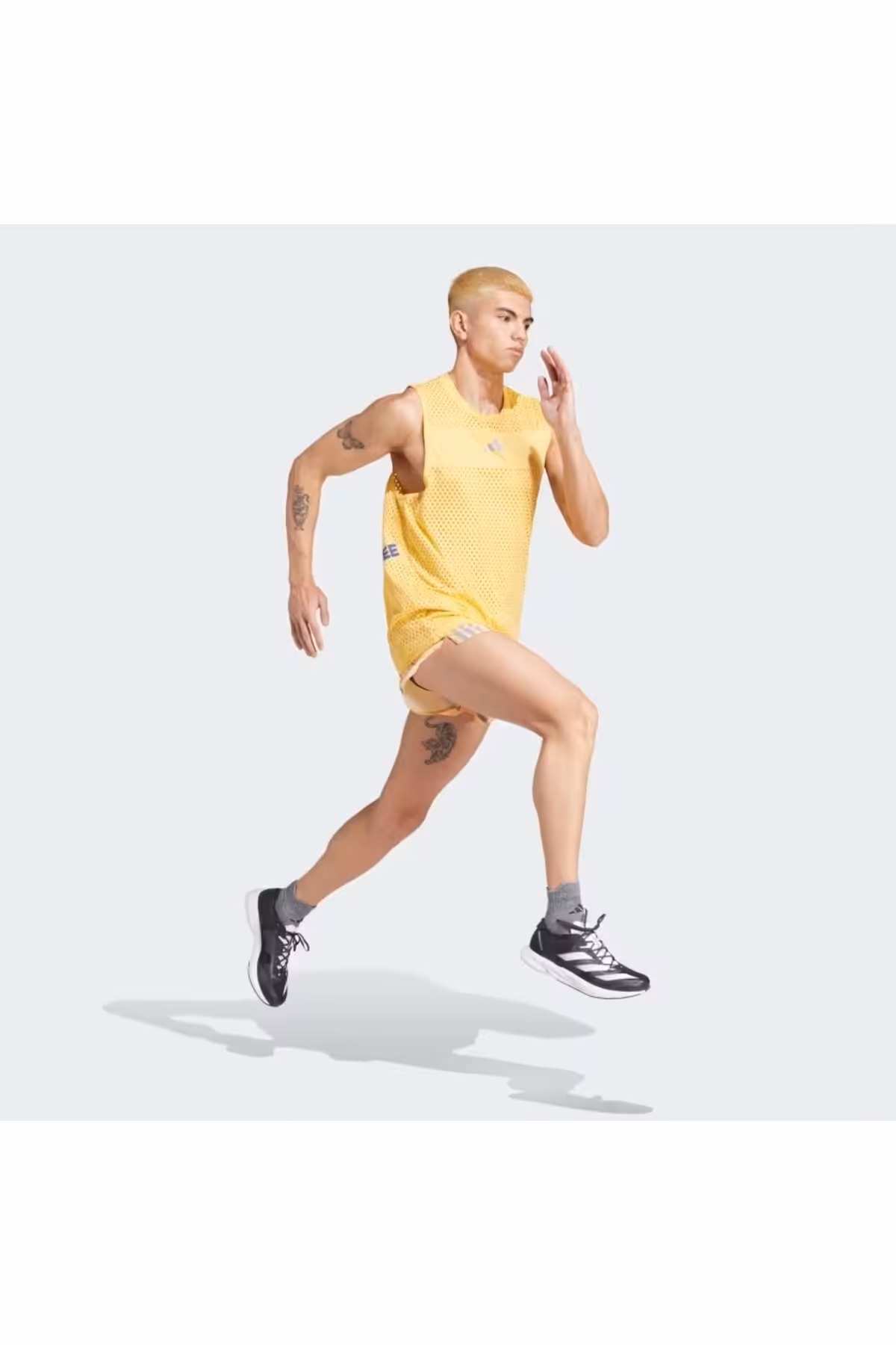 رکابی ورزشی زرد مردانه شکستن ورزشکار در حال رانینگ adidas