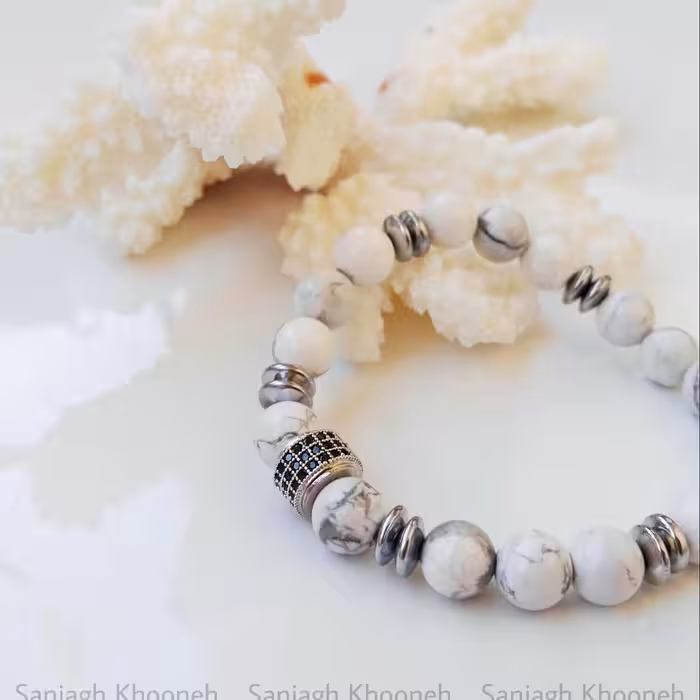 دستبند کشی هائولیت با سنگ حدید و مهره استیل رنگ ثابت