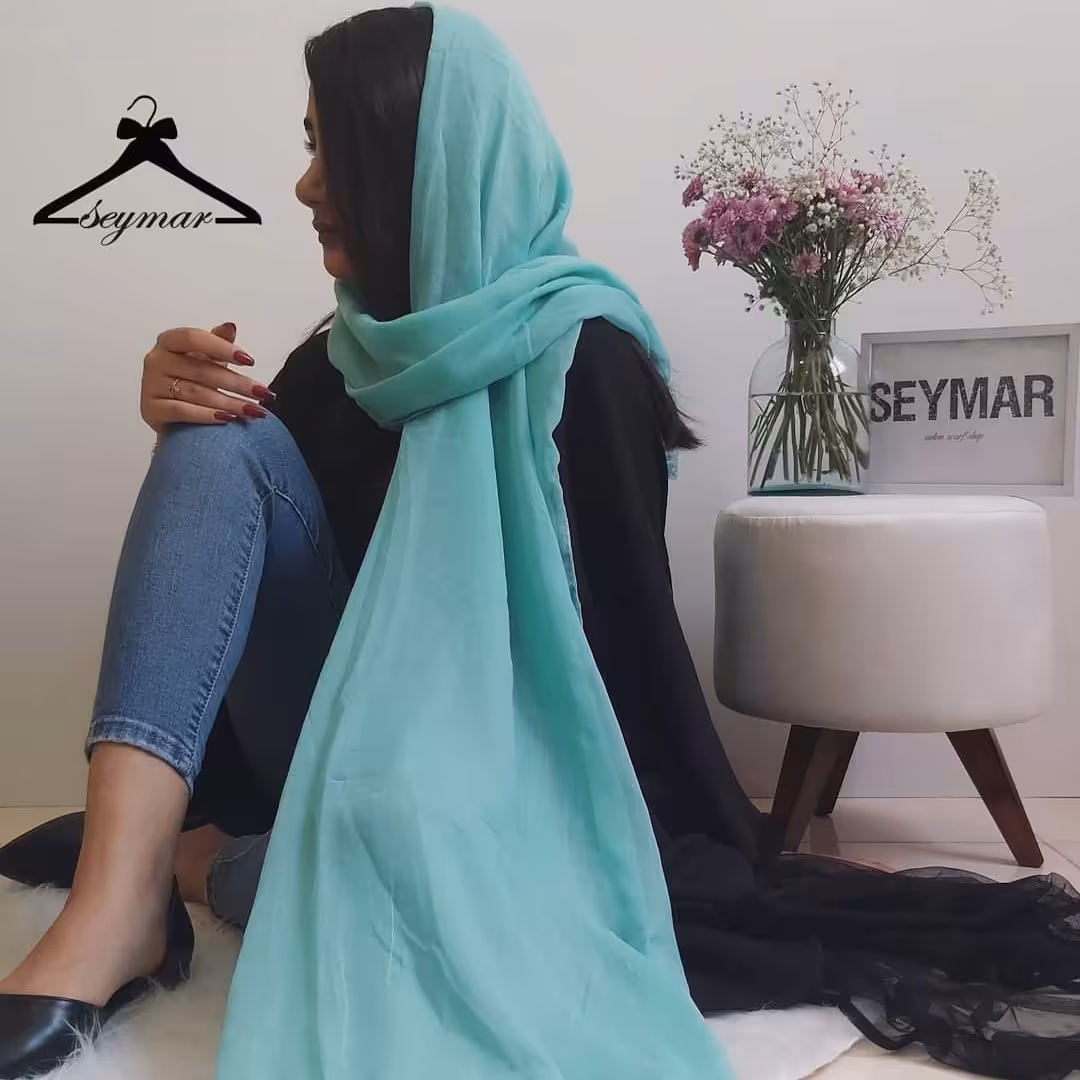 شال نخی فیروزه ای دارای لبه توری گیپوری ، تک رنگ ، جنس نرم و لطیف