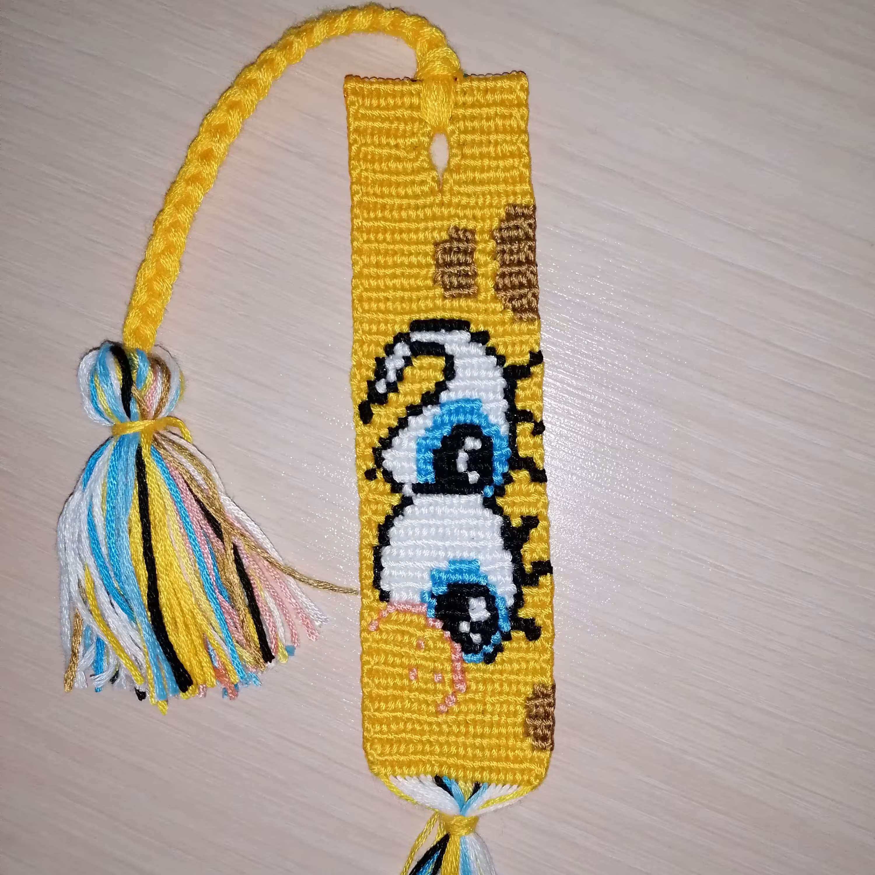 بوک مارک طرح باب اسفنجی نشان گر کتاب بافت الفا منگوله گیس بافت شده عکس پشت کار و رو کار موجوده 