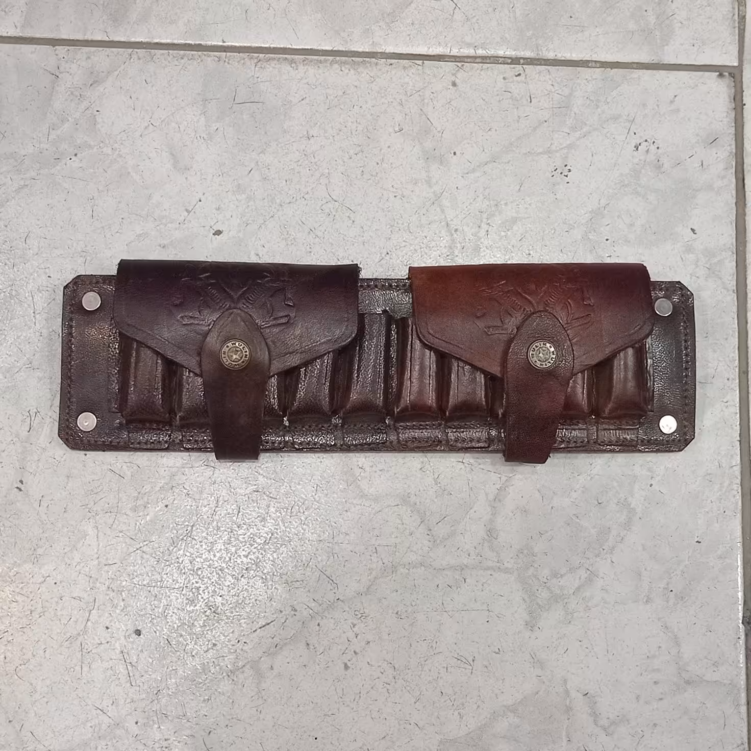 قطار  10 عددی فشنگ ساچمه زنی چرم گاوی قهوه ای رنگ 