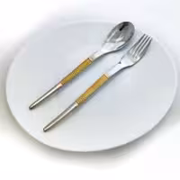 سرویس قاشق و چنگال 24 نفره 120 پارچه یونیک مدل هارمونی نیمه طلایی